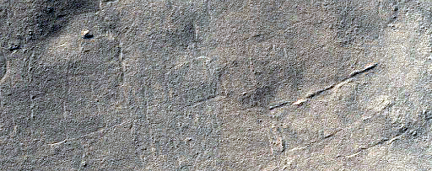 Periglacial Surface Textures and Possible Layered Mesas in Late Summer