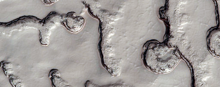 Possible Exposure of Polar Layered Deposits in Area Not Well Observed