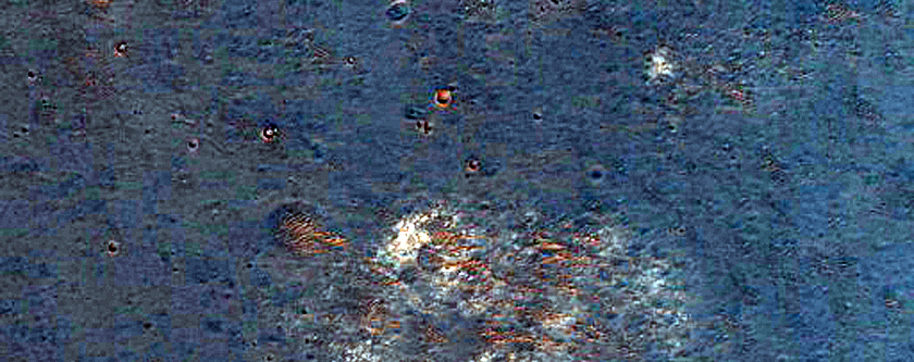 Search for Light-Toned Layering in Plains of Ius Chasma