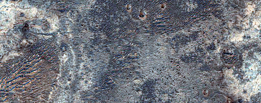 Light-Toned Layering along Plains Southwest of Melas Chasma