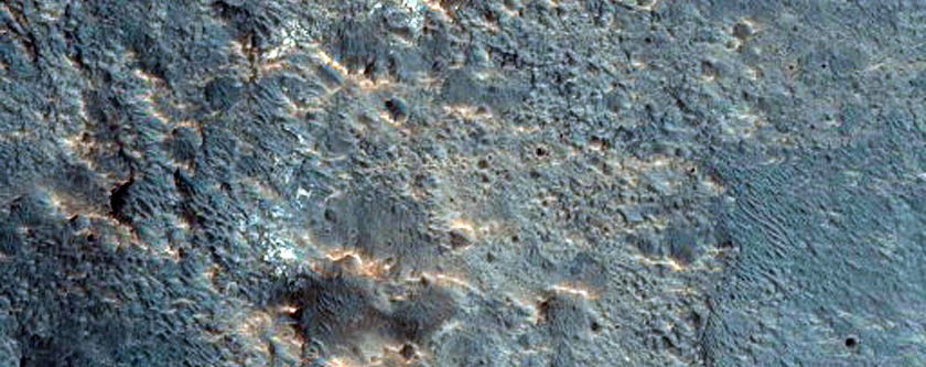 Small Crater and Mesa Northeast of Hellas Region