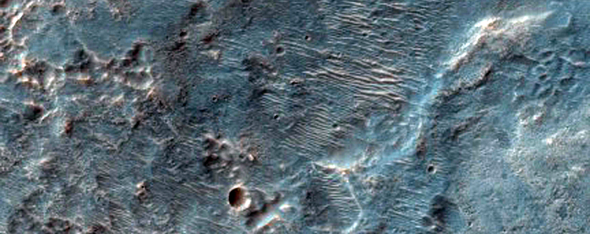 Recent Sharp Streamlined Features and Channels Over Broad Region