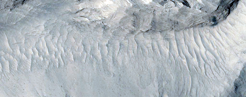 Crater on Zephyria Planum