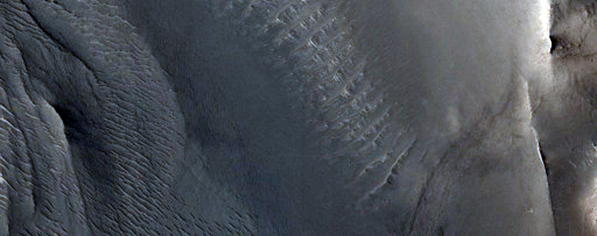 Small Scallops Suggesting Sublimation on North Bank of Auqakuh Vallis