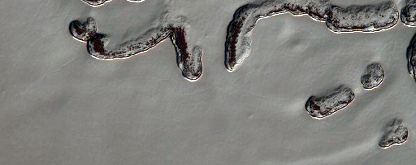 Possible Exposure of Polar Layered Deposits in Area Not Well Observed