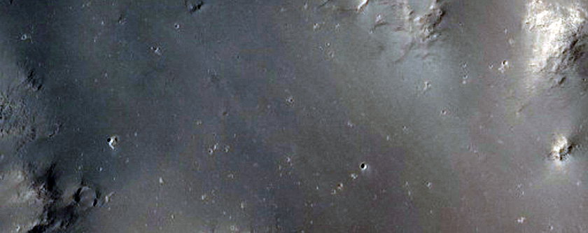 Impact Crater in Medusae Fossae Formation in Memnonia Sulci