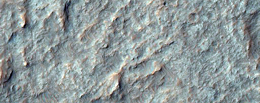 Fractured Unit Filling Crater North of Arda Valles