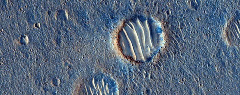 Wind Streaks of Dust-Scoured Surface