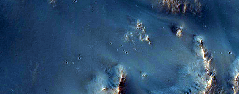Dissected Terraces and Floor of Unnamed Crater North of Hellas Basin