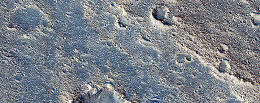 Faded Ray from Tomini Crater and Hebrus Valles Streamlined Islands
