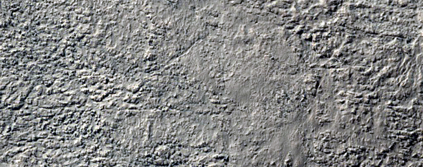 Crater with Central Pit and Tongue-Shaped Features
