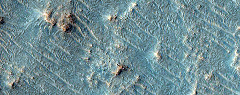 Olivine Signature along Edge of Plains Forming Deposit