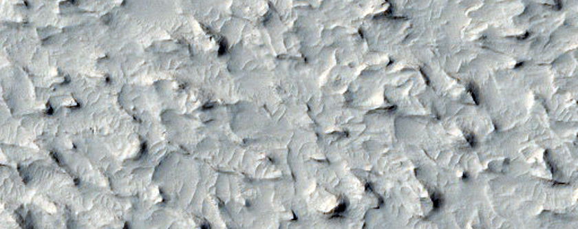 Channel Features Near Memnonia Sulci