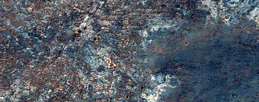 Search For Light-Toned Layering in Ius Plains