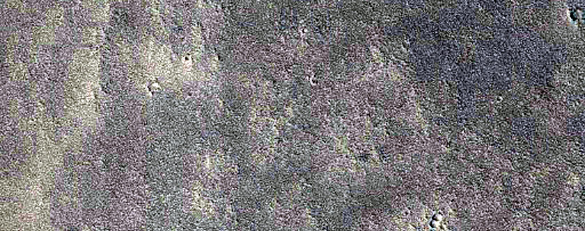 Small Very Recent Dark-Ejecta Crater