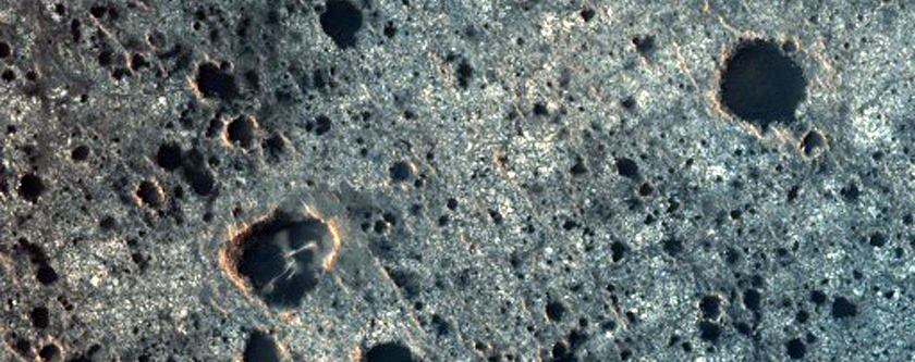 Light-Toned Deposits on Floor of Trouvelot Crater