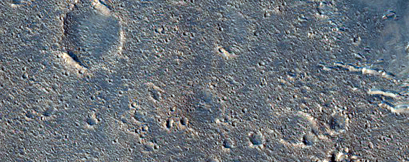 Faded Ray From Tomini Crater and Hebrus Valles Streamlined Islands