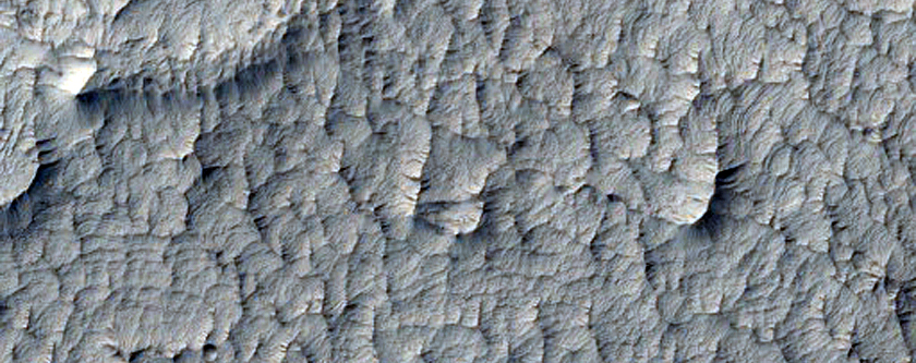 Central Crater Mound with Varied Surface Morphology Including Layers