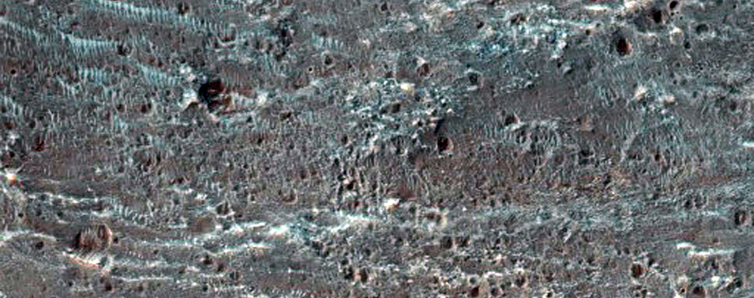 Crater Ejecta in Tyrrhena Terra with Possible Hydrated Minerals
