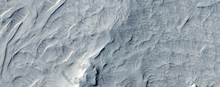 Inverted Fluvial Channels and Craters with Ejecta Rays