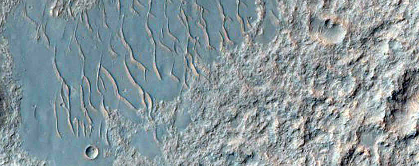 Blocks at Foot of South Eos Chasma Wall with Olivine and Pyroxene Signature