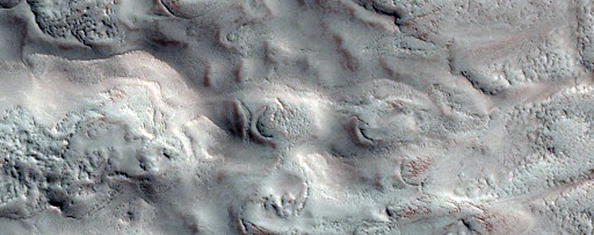 Marginal Ramparts within the Uppermost North Polar Layered Deposits