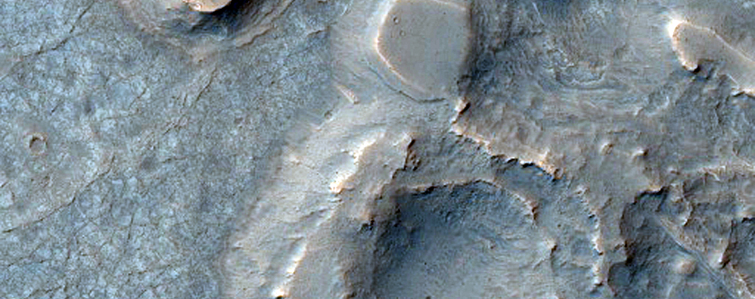 Etched Terrain with Possible Layering West of Juventae Chasma