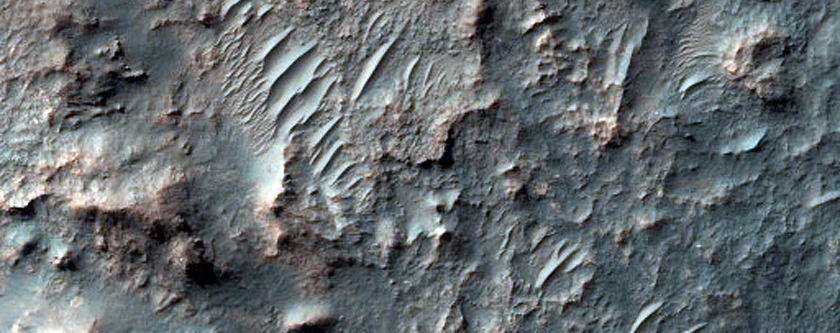 Unmantled Central Uplift Feature in Unnamed Crater