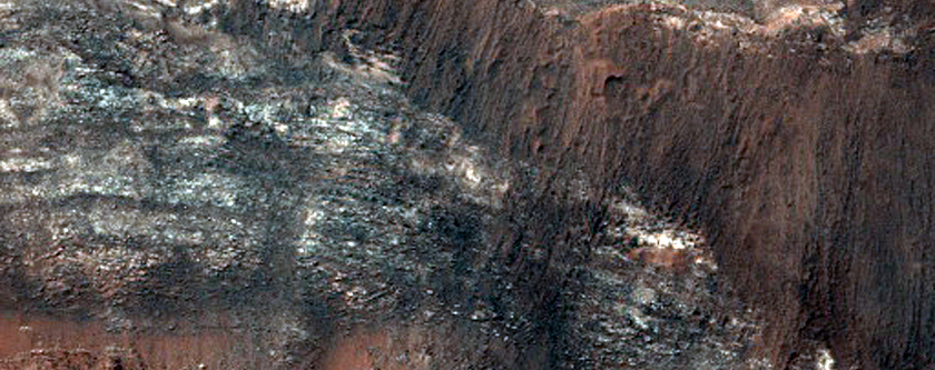 Light-Toned Layered Rock Exposure in Pit in the Nereidum Montes Region