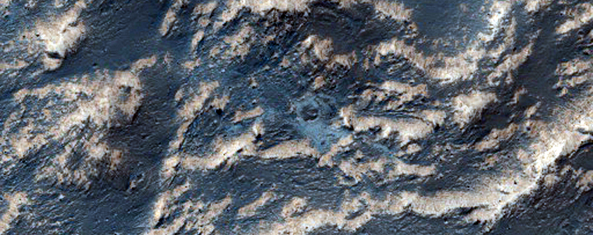Light-Toned Material on Floor of Pit in Noctis Labyrinthus