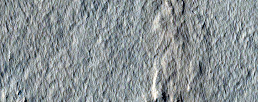 Interaction between Unnamed Crater Ejecta and Pre-Exsisting Terrain