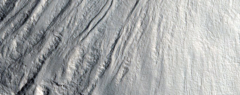 Crater in the Adamas Labyrinthus Region Seen in THEMIS Image V21701005