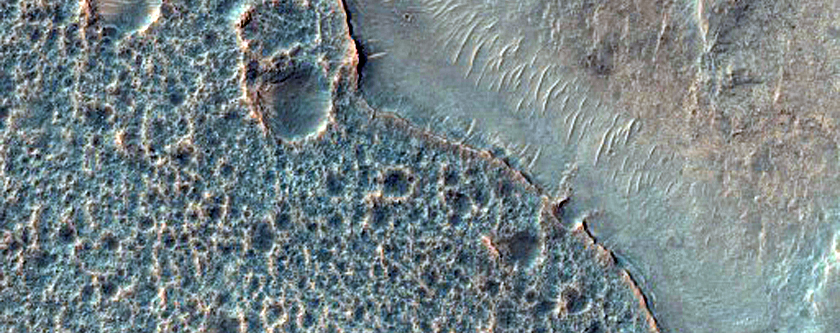 Olivine-Rich Ponded Materials in Unnamed Crater North of Ophir Chasma