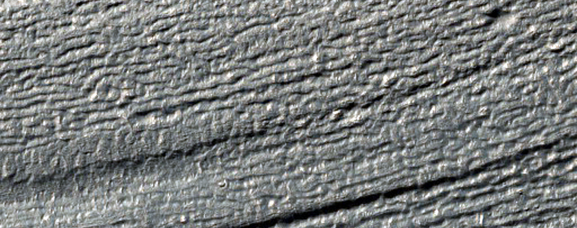 Lineated Debris Flow in Small Steep Valley North of Reull Valles