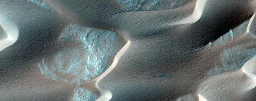 Crater in Dune Field with Avalanche Features on Crater Wall