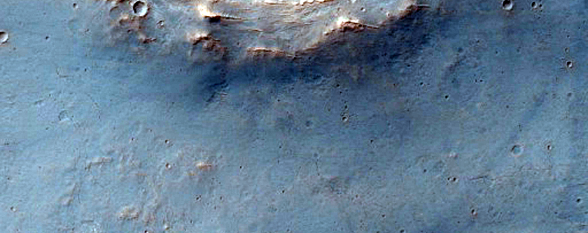 Light-Toned Layered Deposits Along Plains South of Ius Chasma