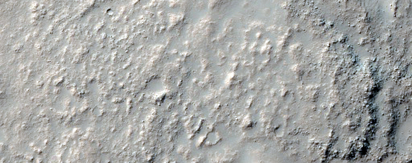 Dissected Mantle Terrain and Flow Feature in Noachis Terra