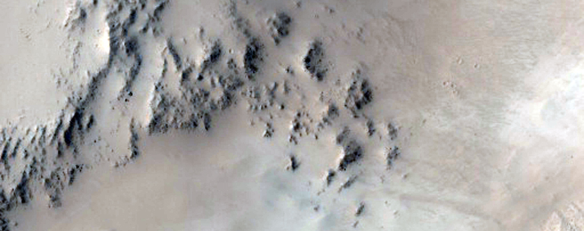 Fresh Impact Crater in the Tartarus Montes