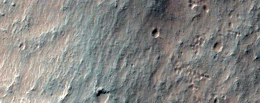 Sirenum Fossae Fissures Intersecting An Impact Crater