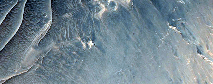Light-Toned Layered Rock Exposed in Landslide in Ius Chasma