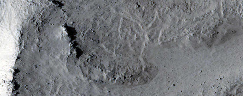 Fresh Impact Crater with a Gullied Central Peak