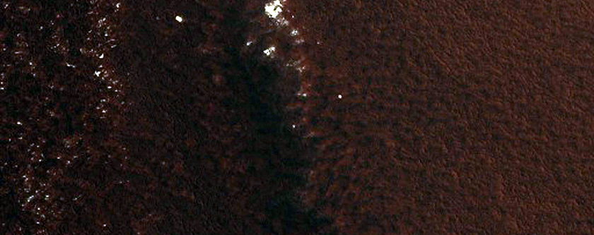 Northern Crater with Possible Phyllosilicates on Western Rim
