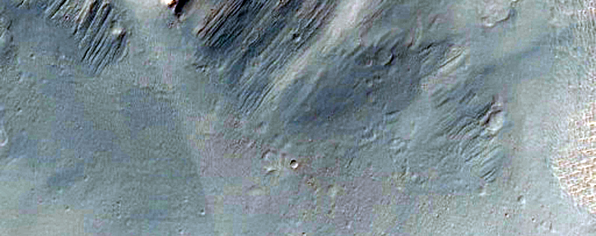 Layering in Eastern Central Peak of Oudemans Crater