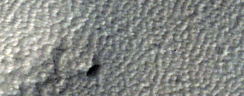 Small Dark-Rayed Crater on Ulysses Patera