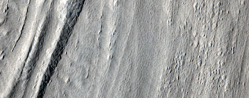 Tongue-Shaped Feature on Slope Seen in MOC Images R04-02106 and R12-01135