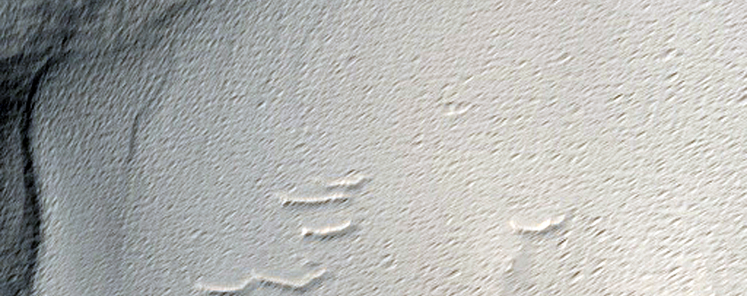 Crater with Lobate Ejecta in Noctis Labyrinthus