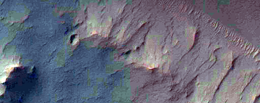 Possible Subsurface Erosion Features in Central Peak of a Crater
