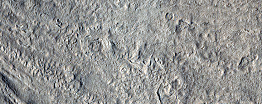 Elliptical Crater with Flow Features