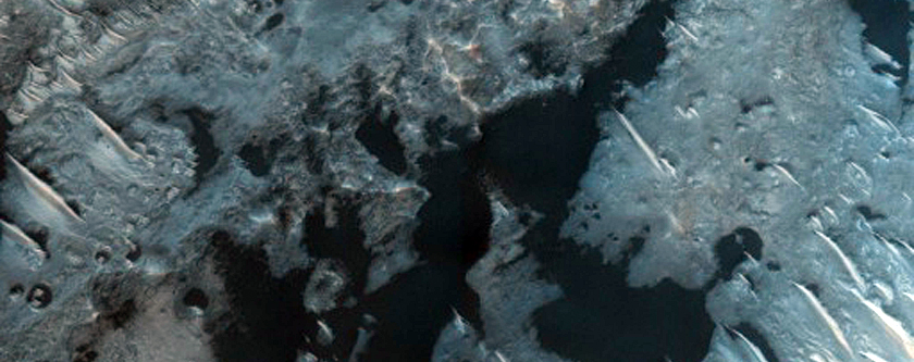 Dark Dunes over Light-Toned Mega-Ripples Seen in MOC Image SP1-26004