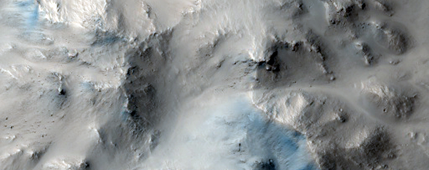 Terrace Channels and Ponded Materials in Isidis Region Crater